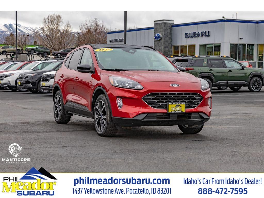2022 Ford Escape SEL in Rapid Red Metallic Tinted Clearcoat — front three-quarter view