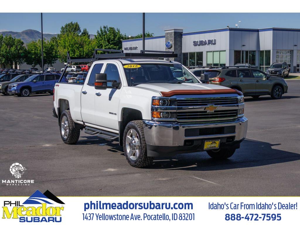 2018 Chevrolet Silverado Work Truck in Summit White — front three-quarter view