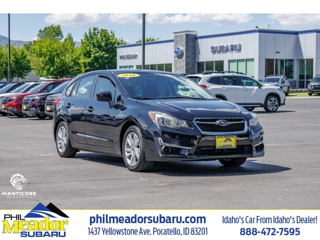 2016 Subaru Impreza 2.0i Premium in Crystal Black Silica — front three-quarter view
