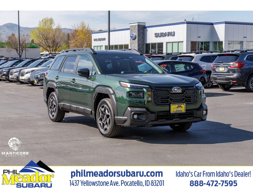 2026 Subaru Outback Touring in Deep Emerald Green Pearl — front three-quarter view