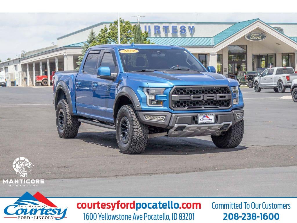 2019 Ford F-150 Raptor in Blue — front three-quarter view
