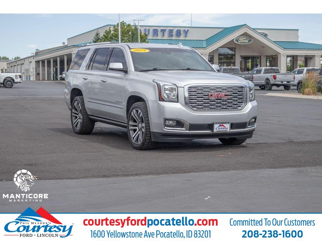 2019 GMC Yukon Denali in Silver — front three-quarter view