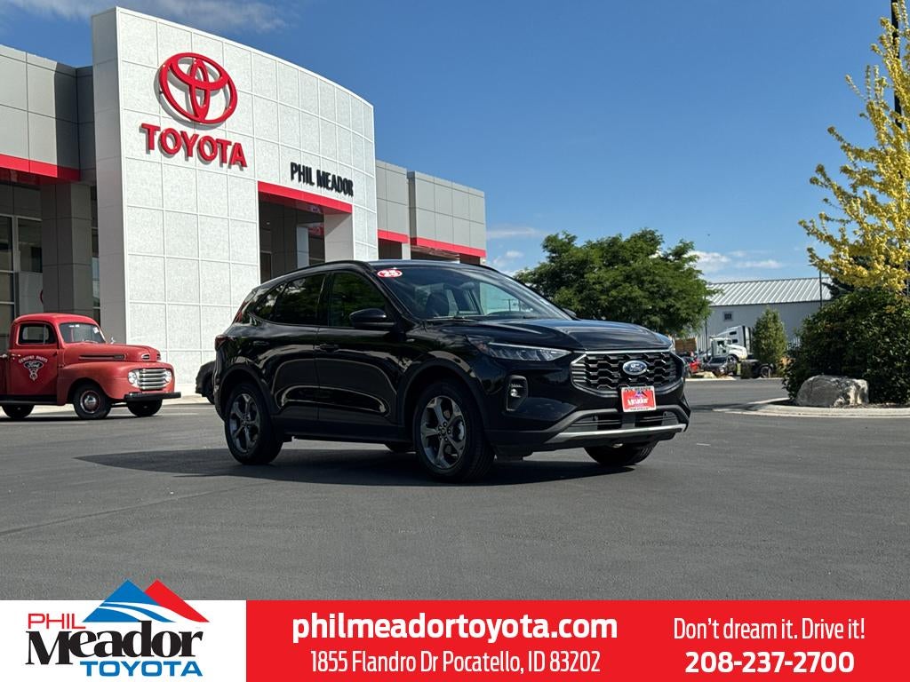 2025 Ford Escape ST-Line Select in Agate Black Metallic — front three-quarter view